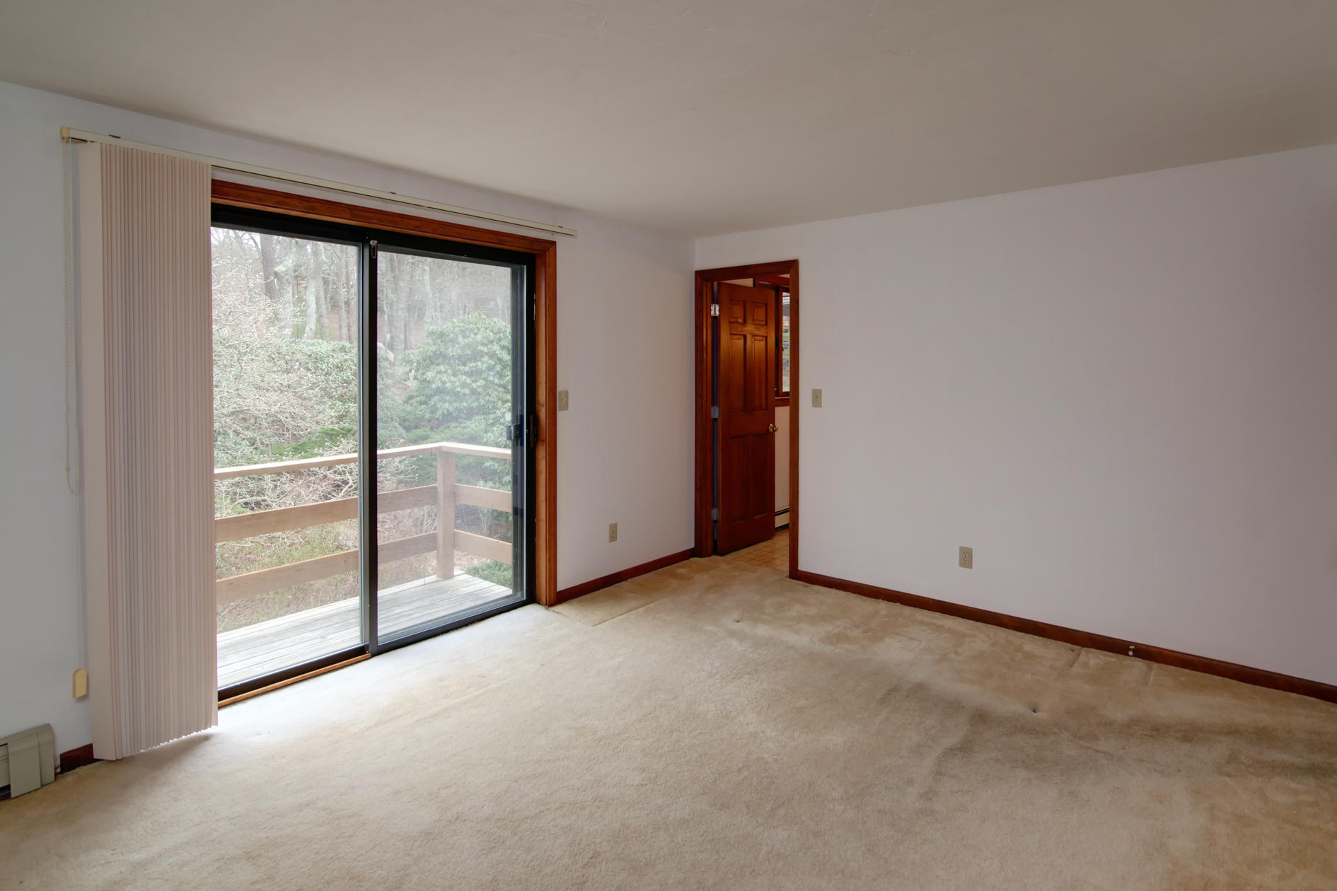 3 Easting Road Bourne, MA 02532 - Photo 22 of 35 an empty room with sliding glass door