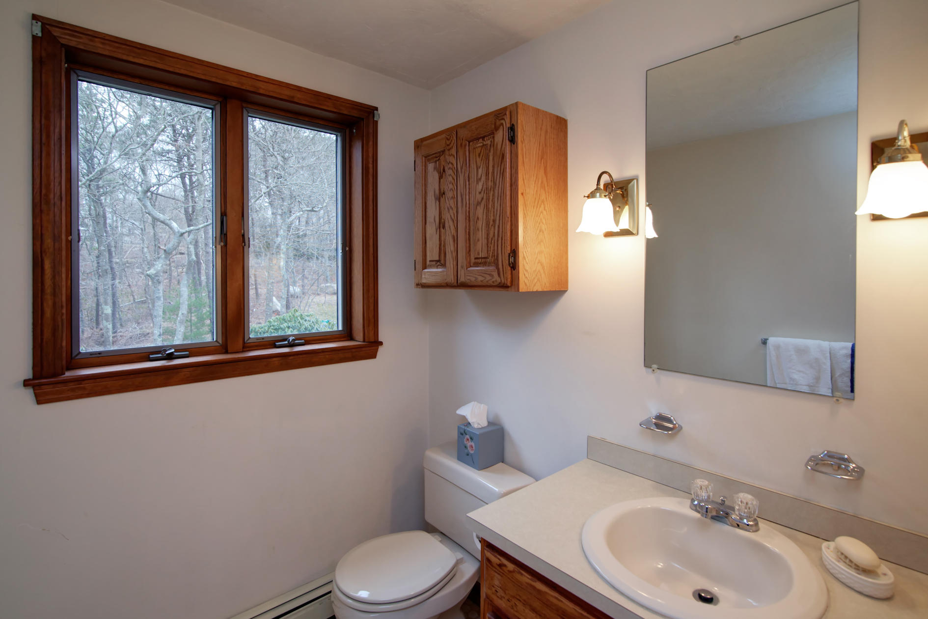 3 Easting Road Bourne, MA 02532 - Photo 34 of 35 a bathroom with a toilet sink and mirror