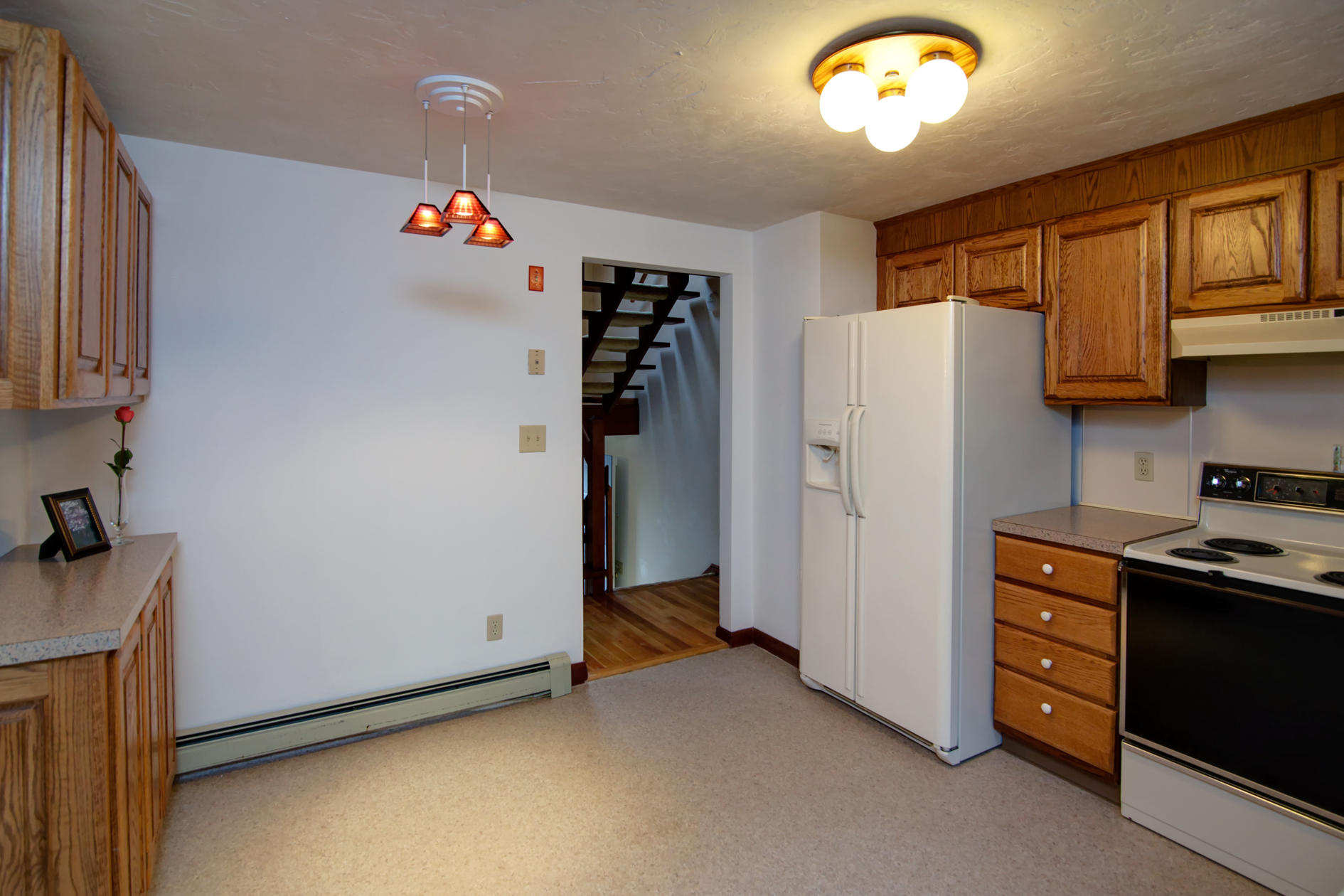 3 Easting Road Bourne, MA 02532 - Photo 10 of 35 a kitchen with stainless steel appliances granite countertop a refrigerator and a stove