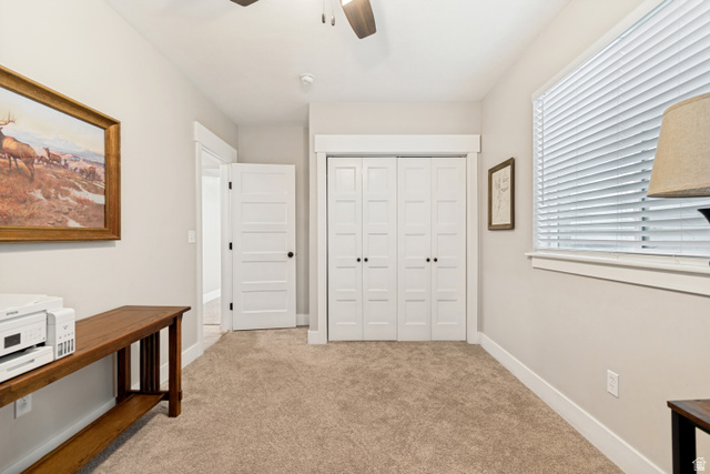 332 South 500 West Payson, UT 84651 - Photo 34 of 50 Neutral-toned room featuring plush carpet flooring, white trim, and a large window