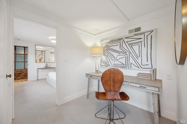 a room with table and chairs