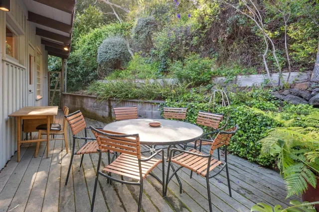 a view of a table and chairs in the patio