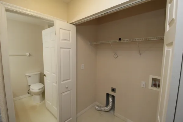 a bathroom with a granite countertop sink