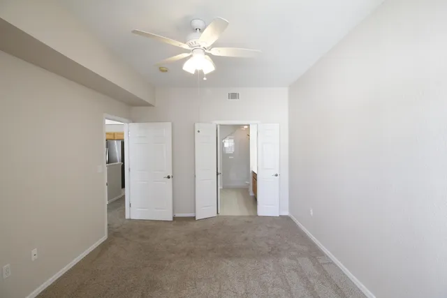 an empty room with a bathroom