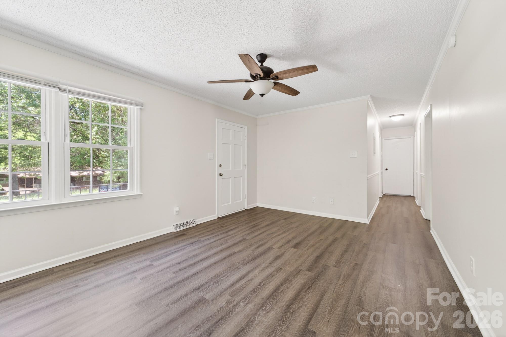204 Harrelson Road Cherryville, NC 28021 - Photo 12 of 34 wooden floor in an empty room with a window