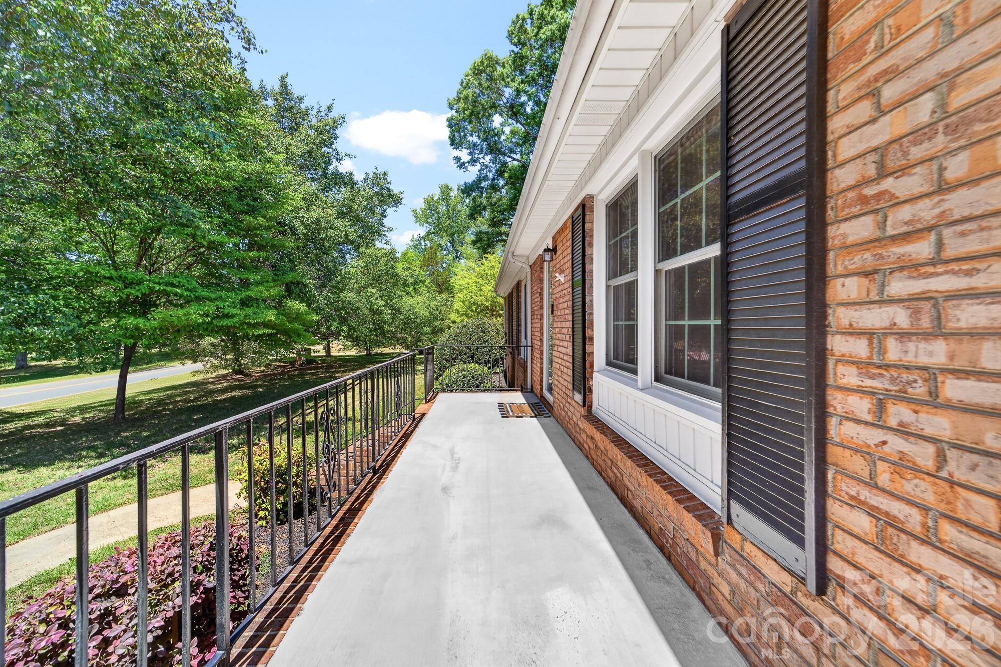 204 Harrelson Road Cherryville, NC 28021 - Photo 6 of 34 a view of a house with a balcony