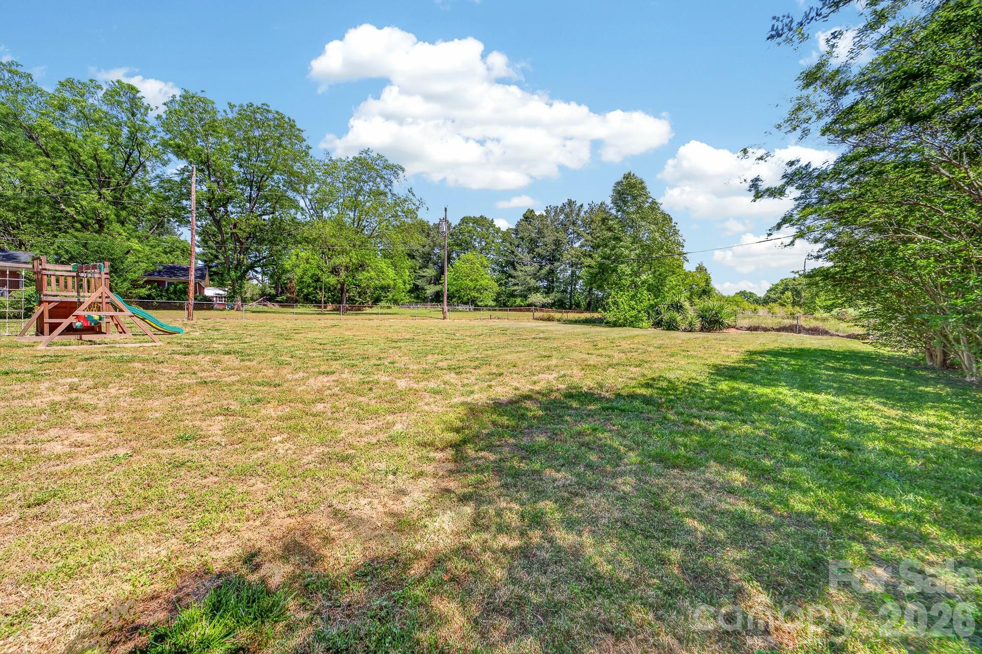 204 Harrelson Road Cherryville, NC 28021 - Photo 10 of 34 a view of outdoor space with deck and green space