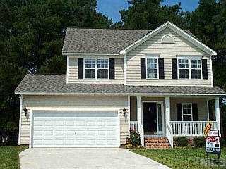 3109 Sedgefield Pines Lane Raleigh, NC 27604 - Photo 1 of 1 a front view of a house with a yard