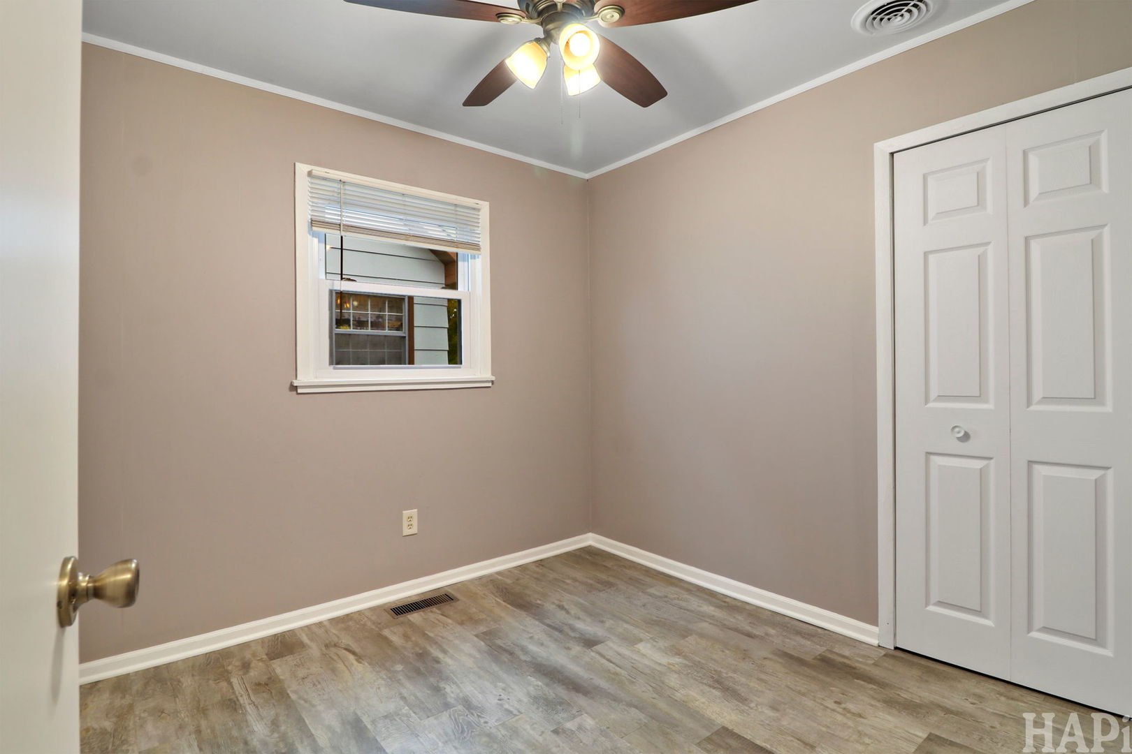 2217 20th Street Zion, IL 60099 - Photo 11 of 24 a view of an empty room with a window