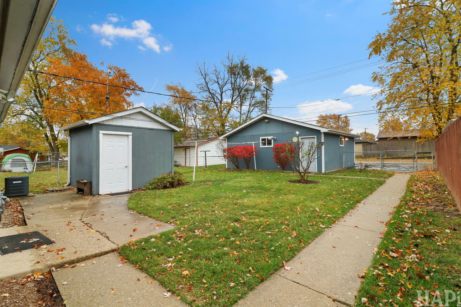 2217 20th Street Zion, IL 60099 - Photo 22 of 24 a front view of a house with garden