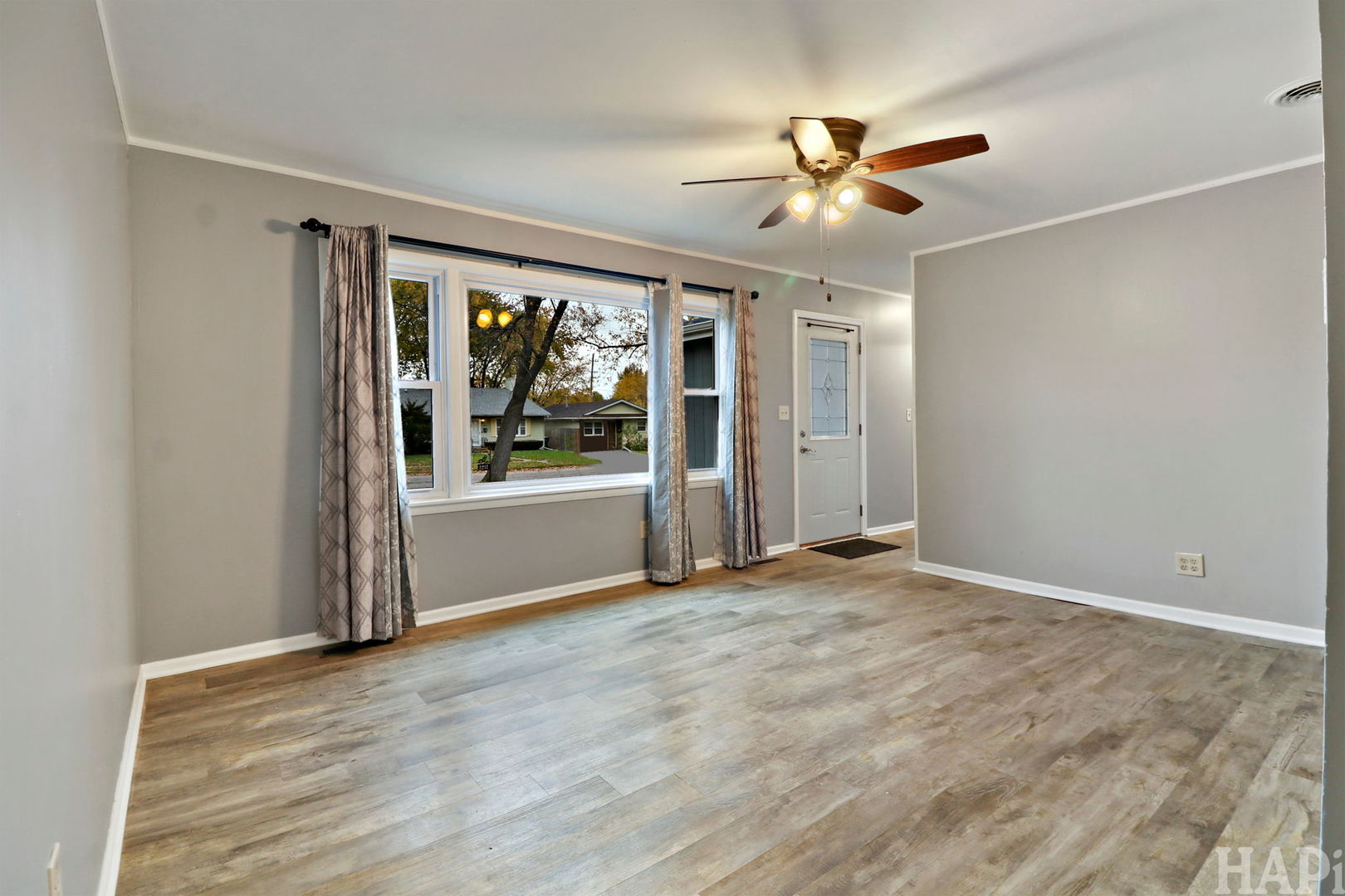 2217 20th Street Zion, IL 60099 - Photo 4 of 24 a view of an empty room with a window