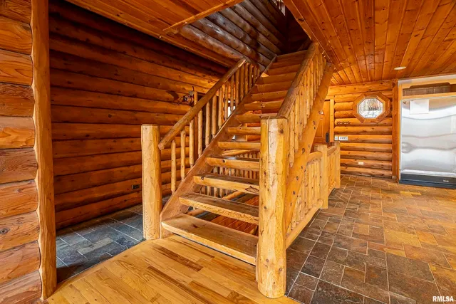 a view of entryway with wooden floor