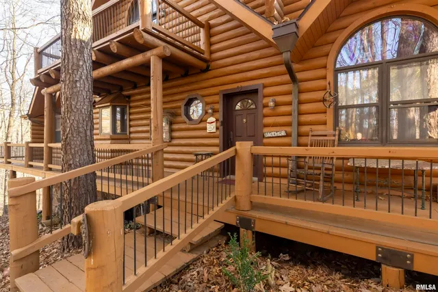 a kitchen with stainless steel appliances granite countertop a stove and a wooden floors