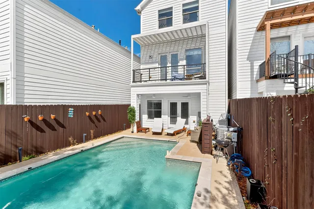 a backyard of a house with seating space