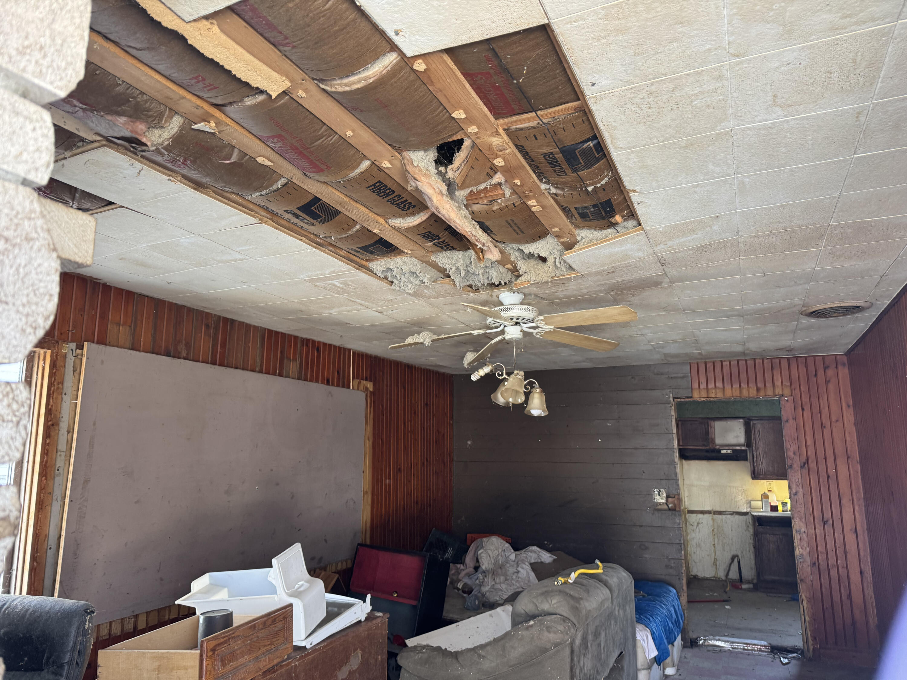 101 Hamlet Street Hamlet, IN 46532 - Photo 4 of 5 a bedroom with a bed and a chandelier fan