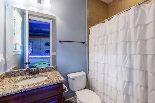 a room with lots of gym equipment