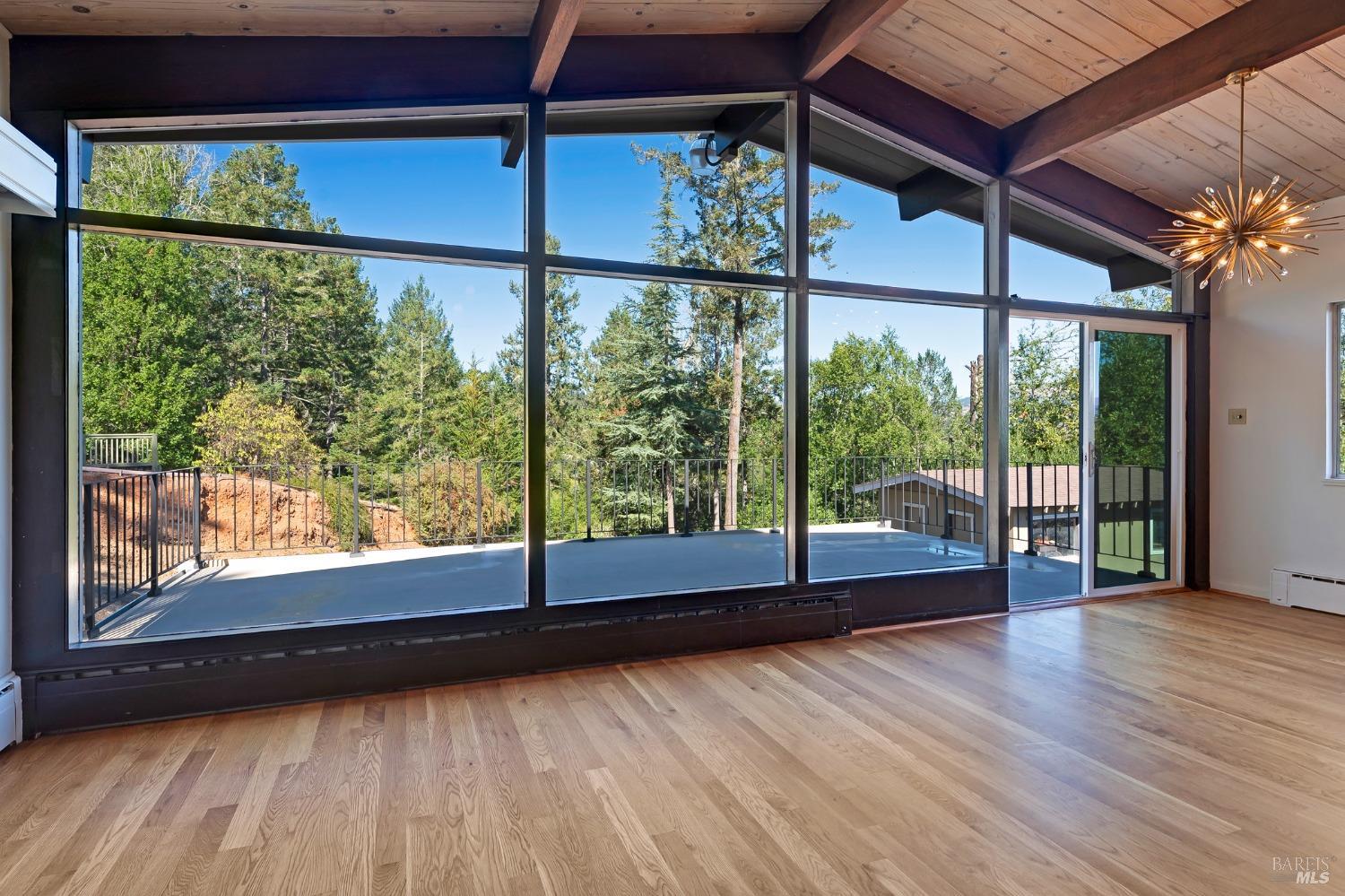 255 Brush Creek Road Santa Rosa, CA 95404 - Photo 1 of 1 a view of a room with wooden floor and windows