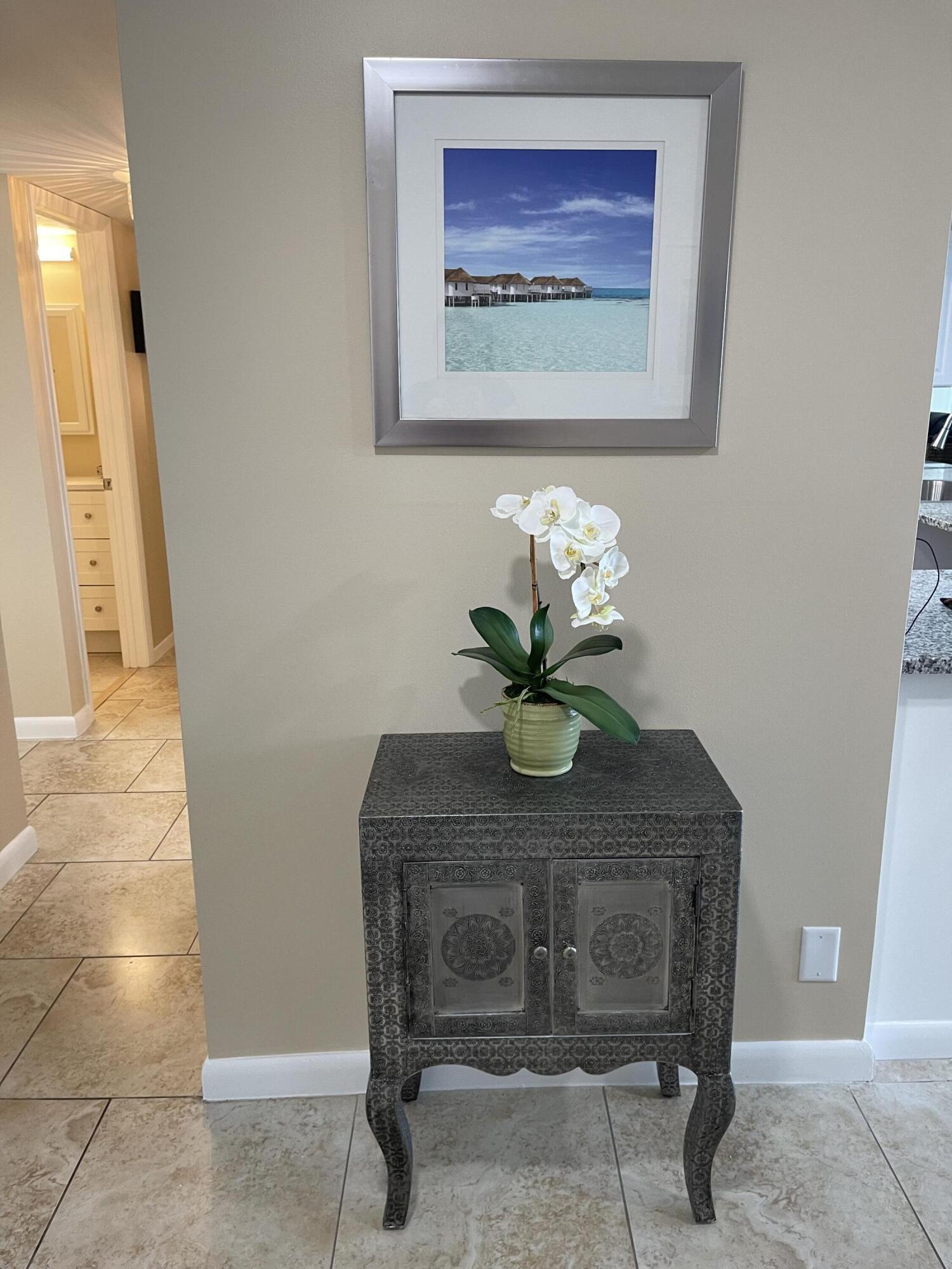 1605 Highway 1, Unit V6306 Jupiter, FL 33477 - Photo 4 of 34 a view of a dining room with furniture