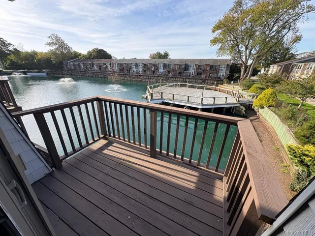 a view of a lake from a balcony