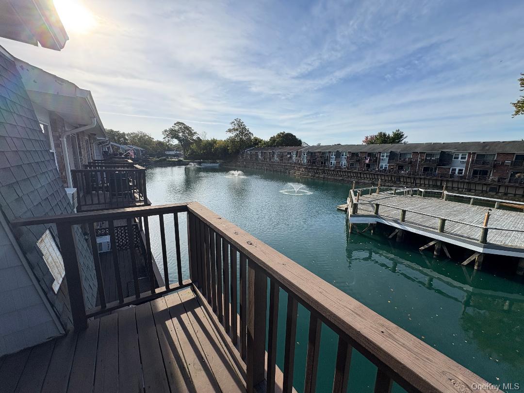 204 Millard Avenue, Unit 204 West Babylon, NY 11704 - Photo 13 of 22 a view of a lake from a balcony