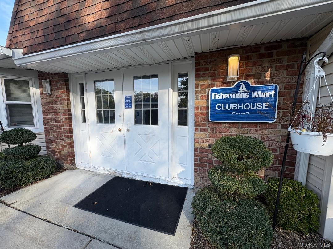 204 Millard Avenue, Unit 204 West Babylon, NY 11704 - Photo 14 of 22 a view of outdoor space and front view of a building