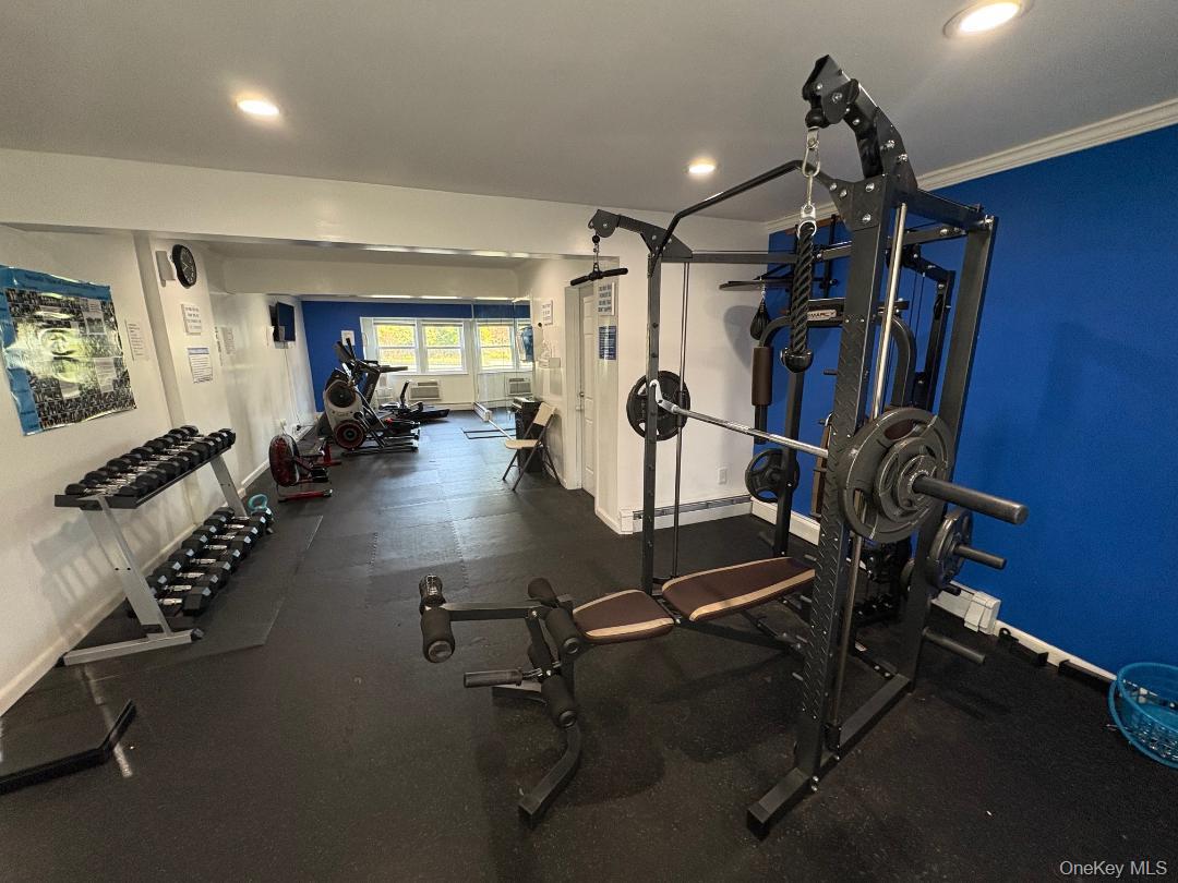 204 Millard Avenue, Unit 204 West Babylon, NY 11704 - Photo 15 of 22 a view of a room with gym equipment