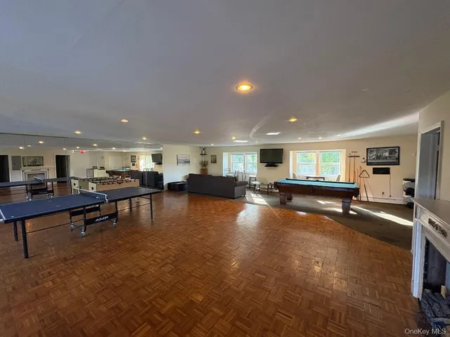 a lobby with furniture and a table