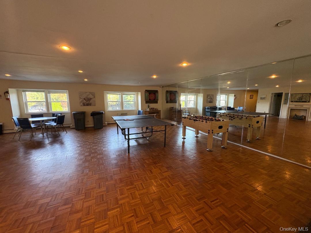 204 Millard Avenue, Unit 204 West Babylon, NY 11704 - Photo 17 of 22 a lobby with furniture and a table