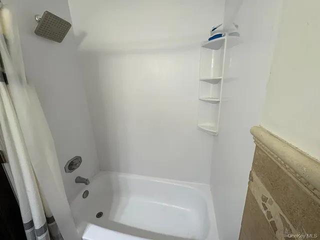 a bathroom with a bathtub