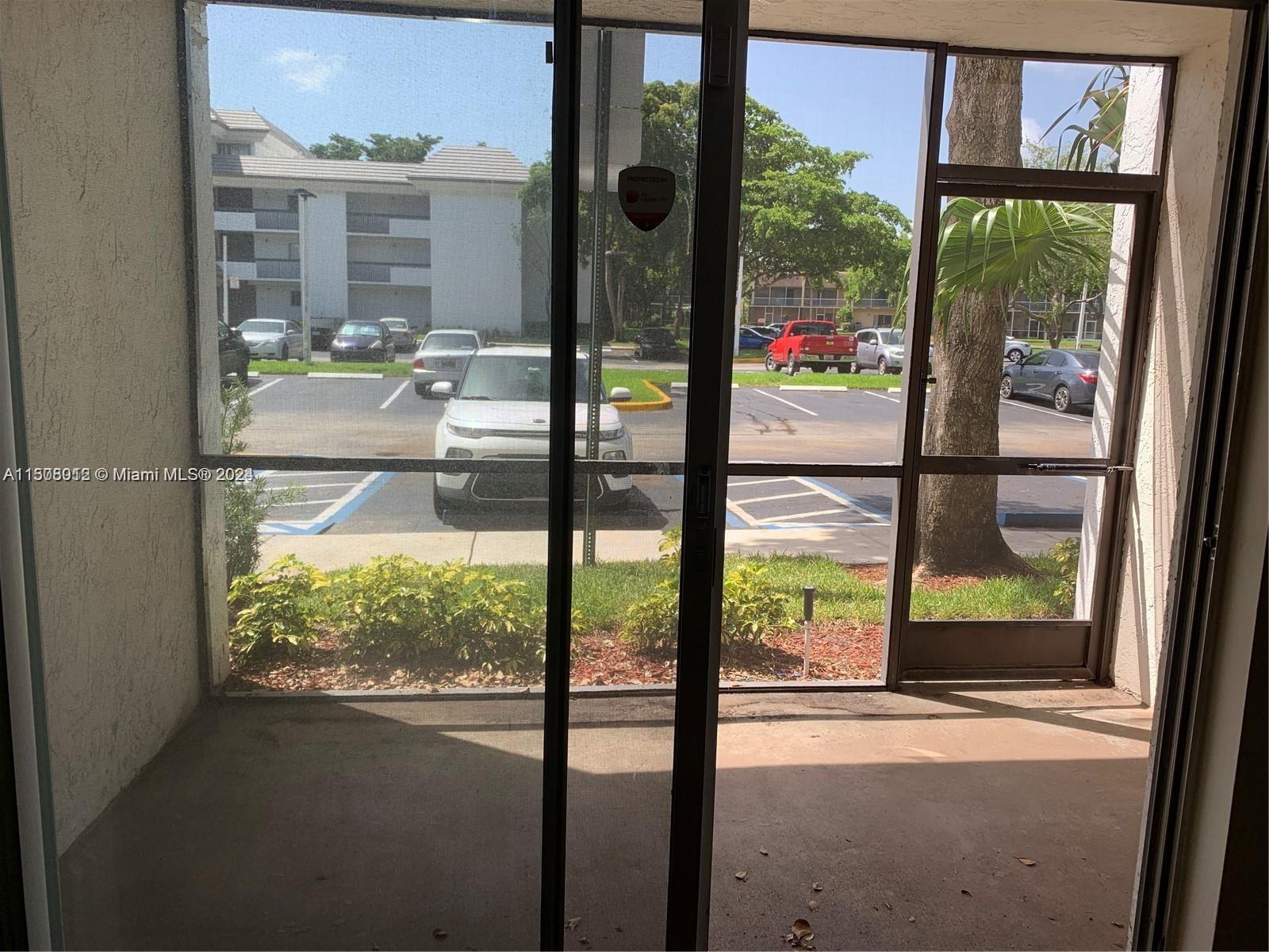 711 North Pine Island Road, Unit 111 Plantation, FL 33324 - Photo 14 of 14 a view of a room with a large window