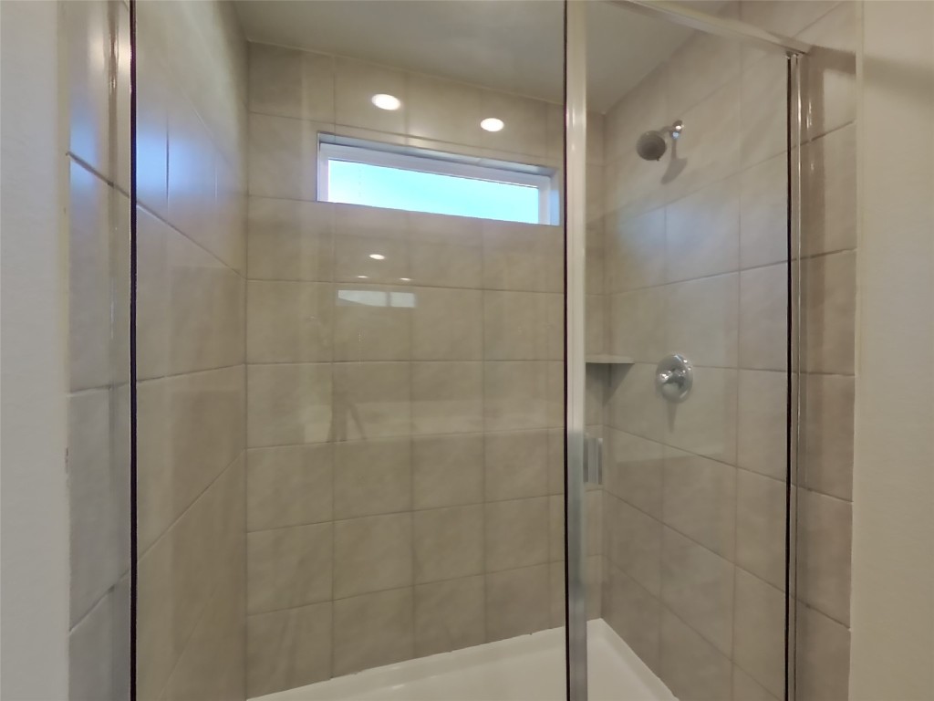 620 Raglands Road Leander, TX 78641 - Photo 8 of 30 Full bathroom with a stall shower