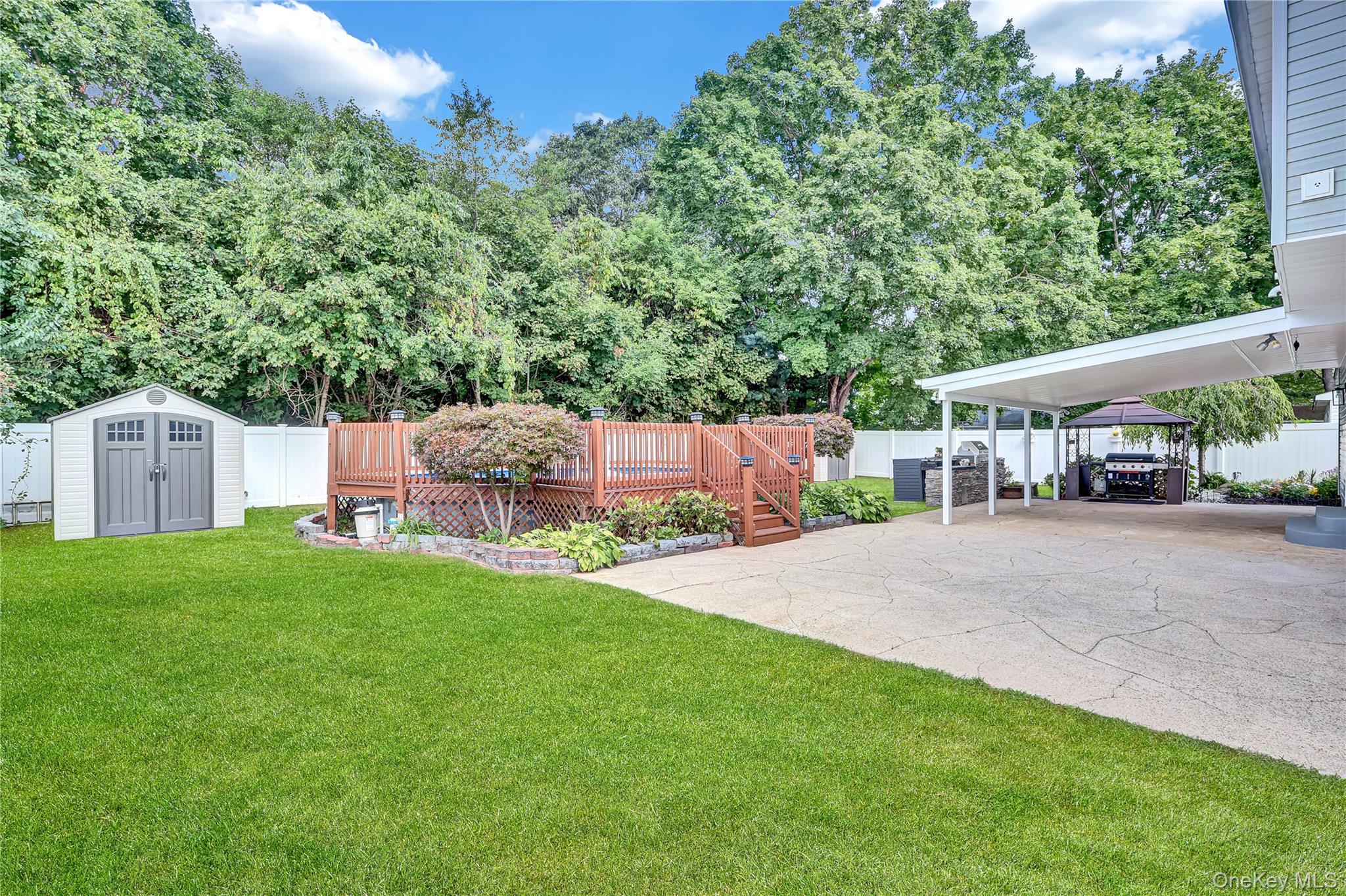 420 Dare Road Selden, NY 11784 - Photo 37 of 42 Large and Level Backyard w/ view of Shed and Pool deck