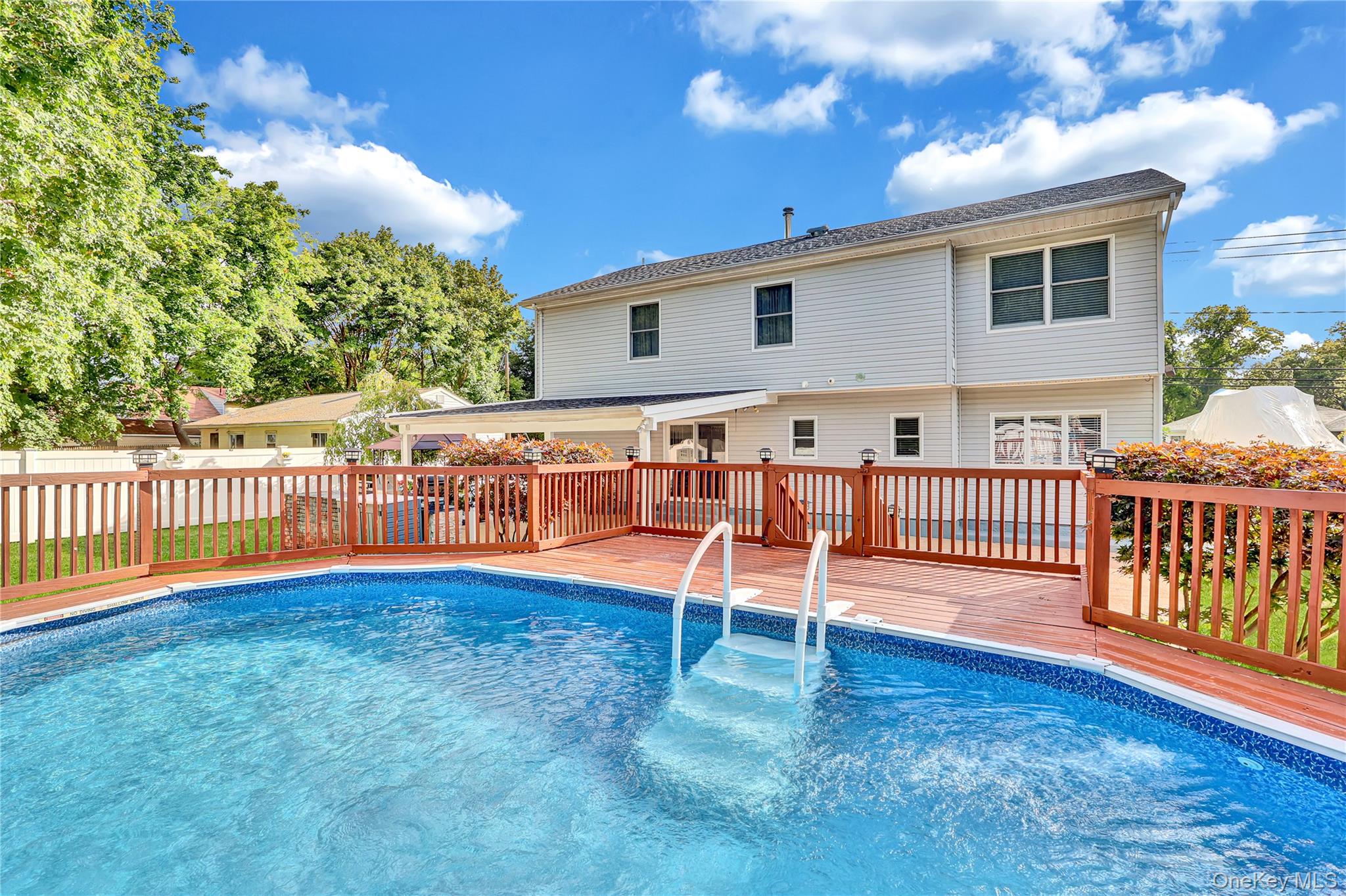 420 Dare Road Selden, NY 11784 - Photo 41 of 42 Above Ground Pool And back of Home View