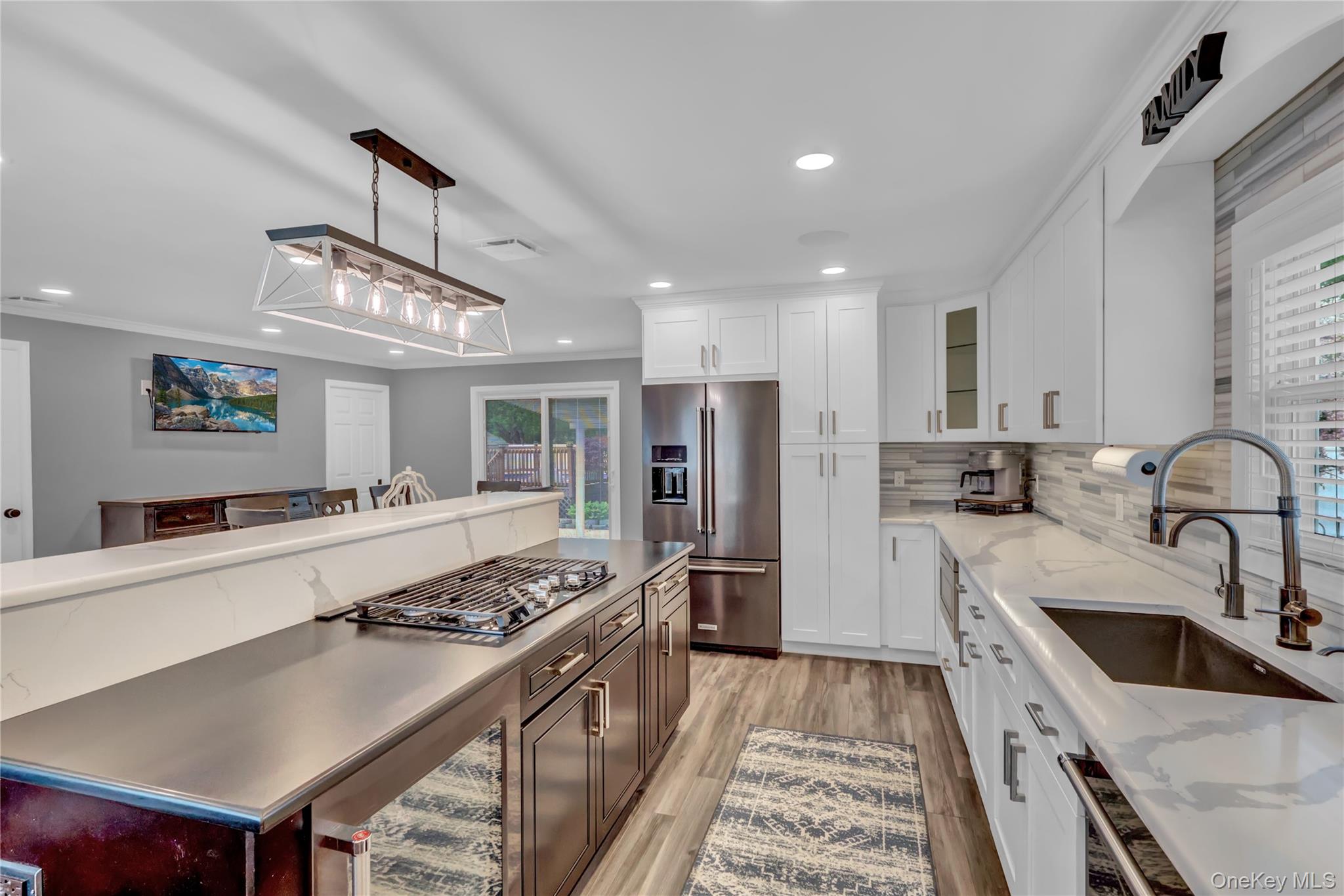 420 Dare Road Selden, NY 11784 - Photo 10 of 42 Kitchen w/ view of Stovetop, Quartz Countertops, Beverage Fridge and Refrigerator