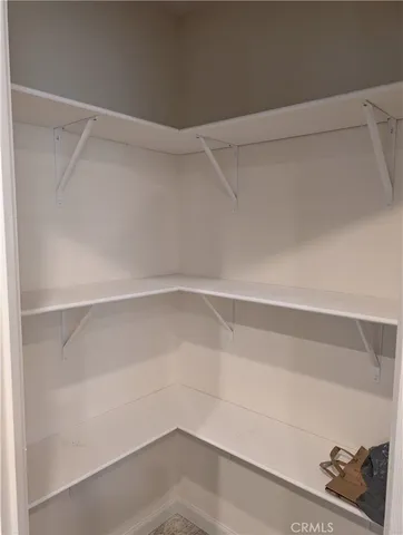 a empty closet with white paint