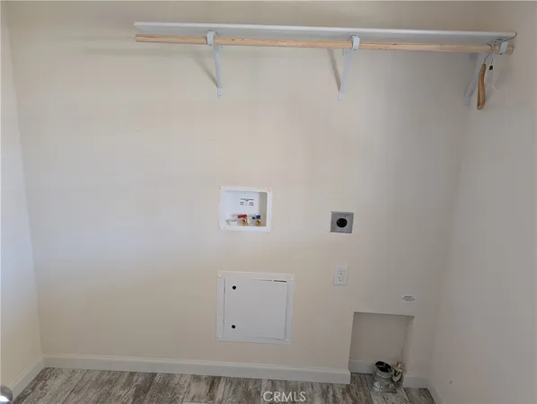 a view of small space with racks on the wall