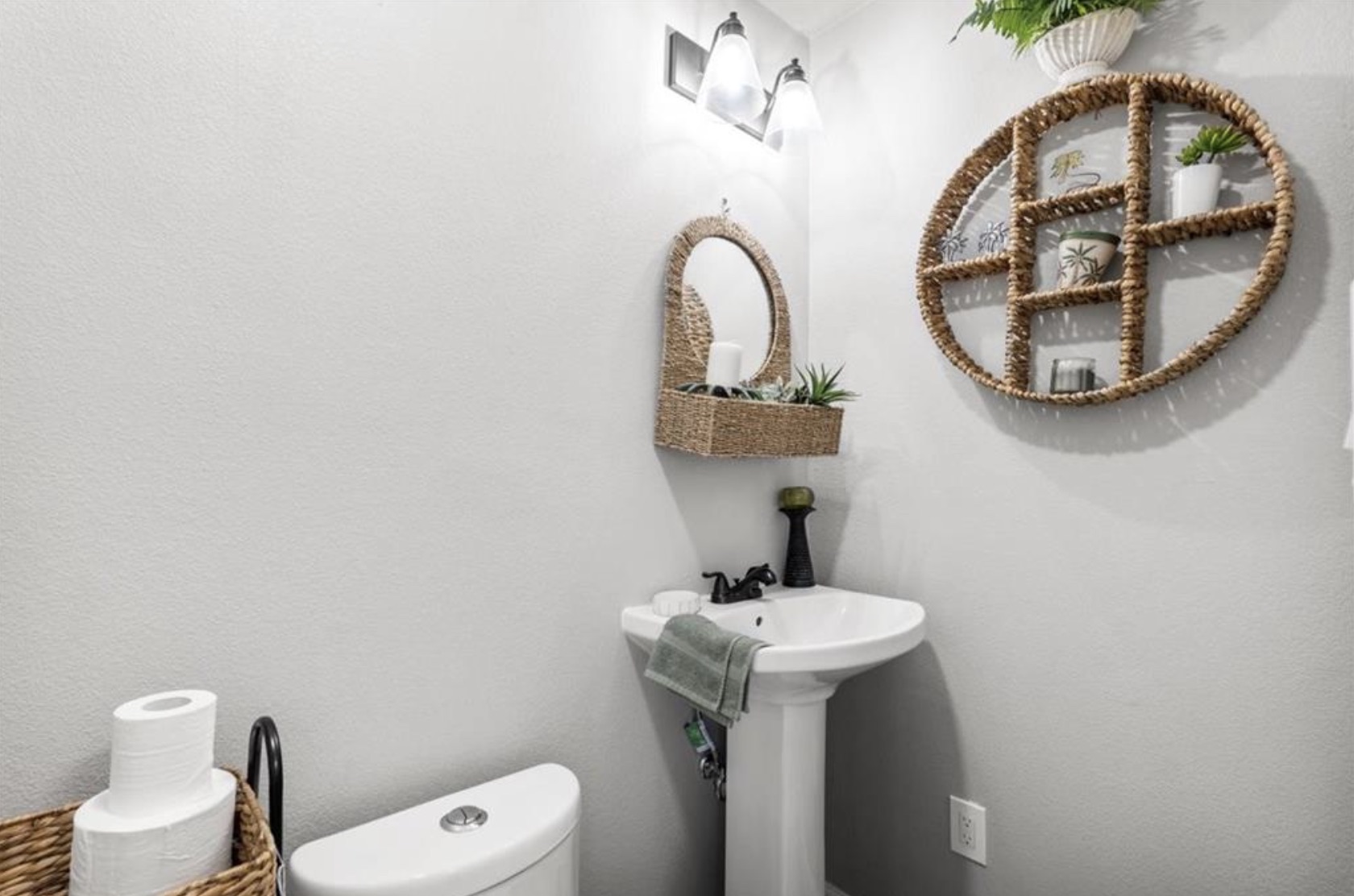 7027 Fm 971 Georgetown, TX 78626 - Photo 14 of 25 a bathroom with a toilet sink and mirror