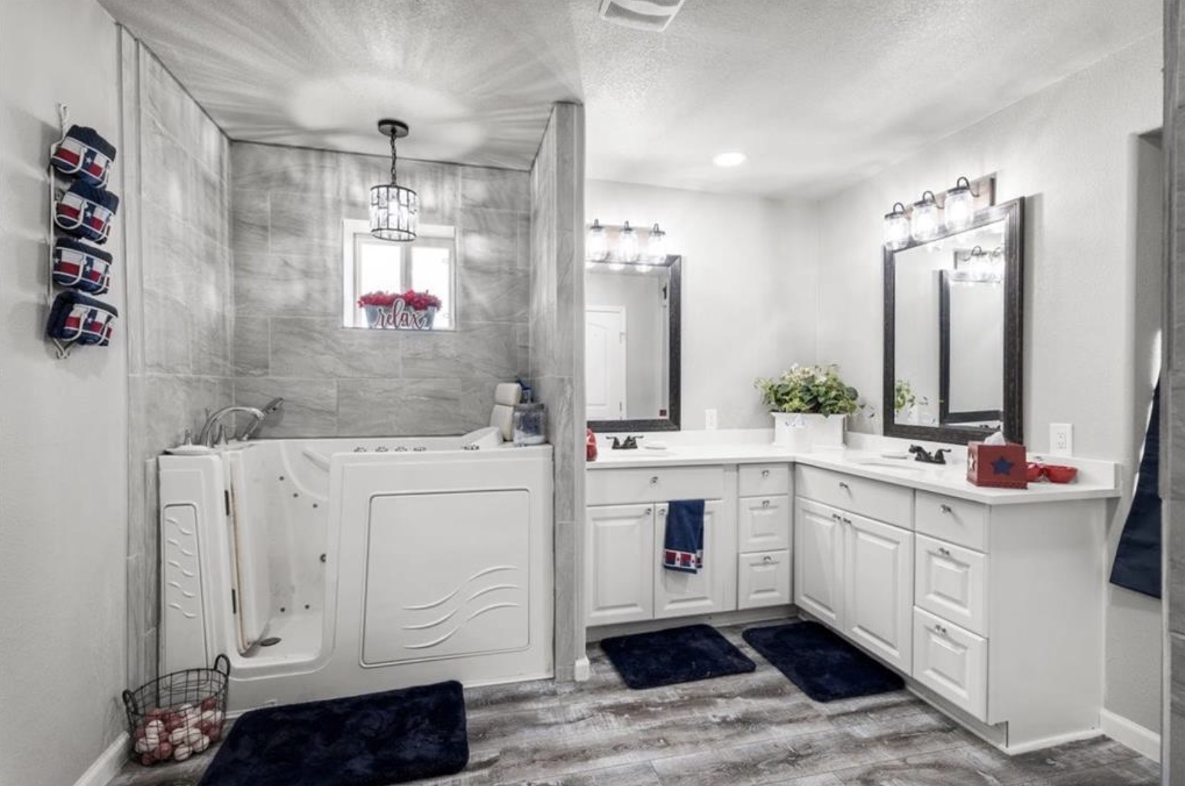 7027 Fm 971 Georgetown, TX 78626 - Photo 17 of 25 a bathroom with a double vanity sink mirror and shower