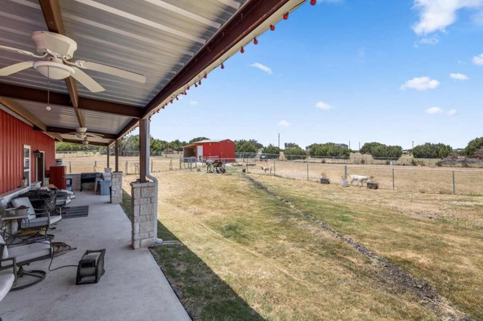 7027 Fm 971 Georgetown, TX 78626 - Photo 22 of 25 a view of swimming pool with a patio and a yard