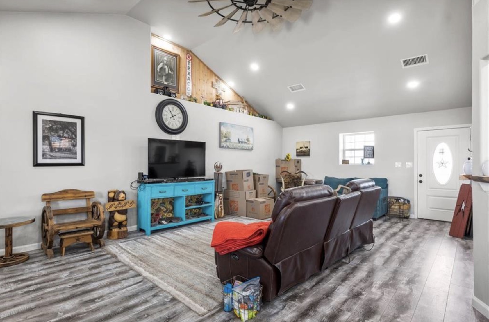7027 Fm 971 Georgetown, TX 78626 - Photo 6 of 25 a living room with furniture and a flat screen tv