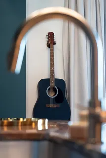 a view of a livingroom with furniture and a couch
