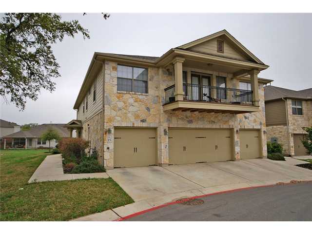 14815 Avery Ranch Boulevard, Unit 1502 Austin, TX 78717 - Photo 1 of 1 a front view of a house with a garden