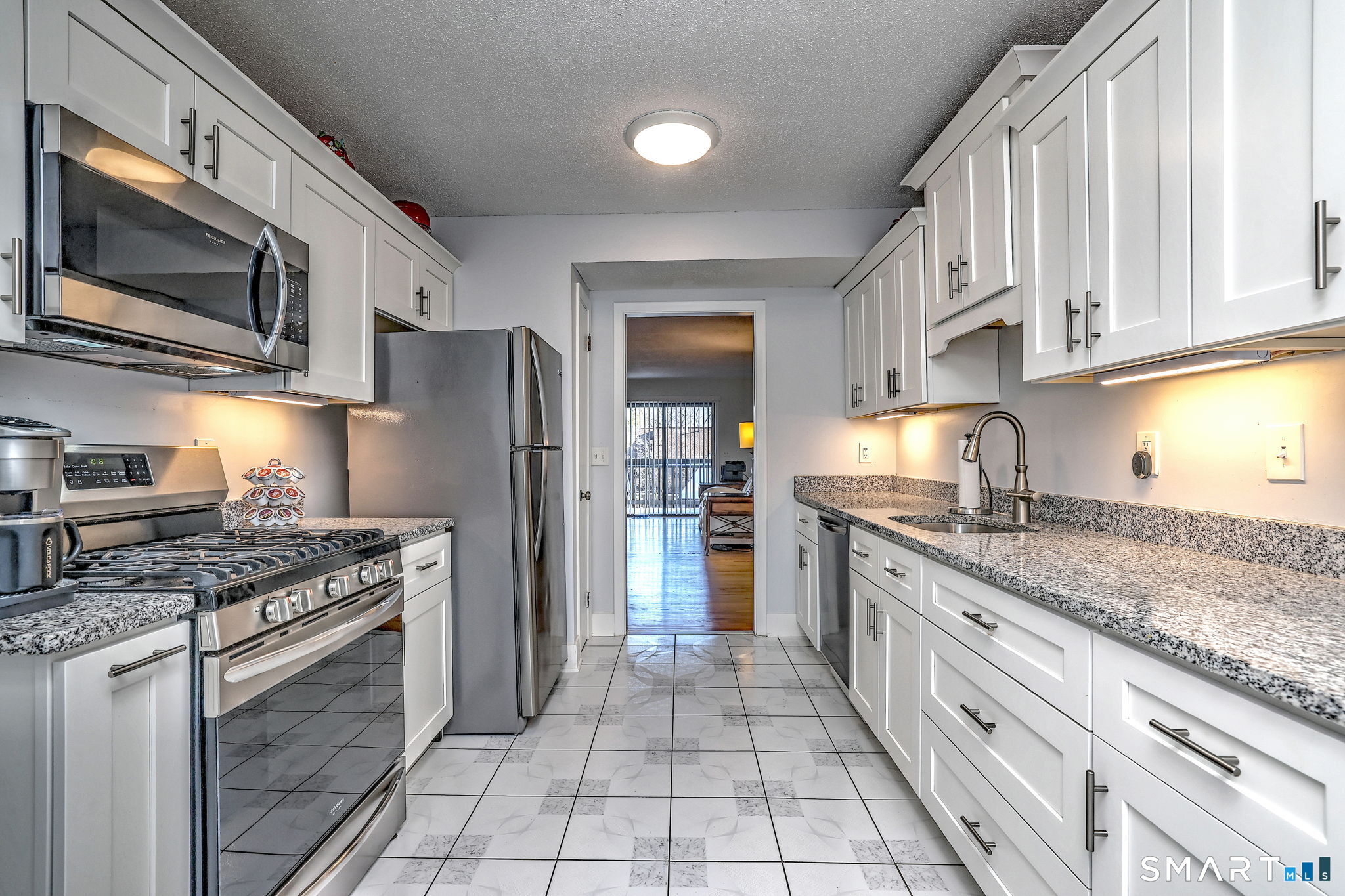 160 Brittany Farms Road, Unit D New Britain, CT 06053 - Photo 3 of 21 Remodeled kitchen cabinets, granite counters, backsplash, stainless steel appliances. All the work has been done for you.