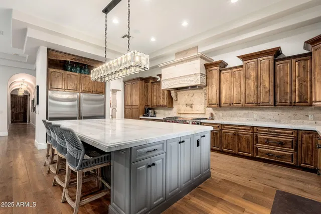 a living room with furniture flat screen tv and a fireplace