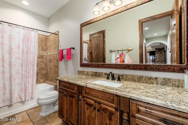 a view of a house with a yard and garage