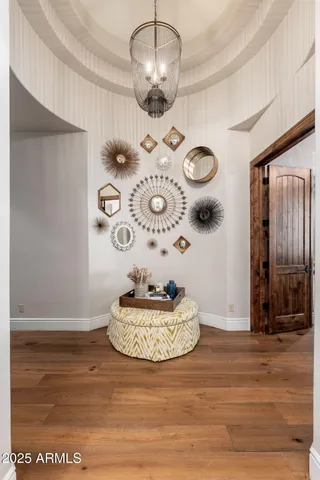 a view of a bathroom with a tub shower and mirror