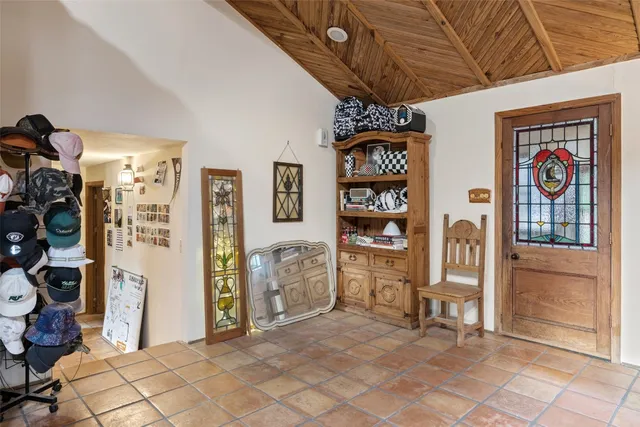a bathroom with a bathtub sink and mirror