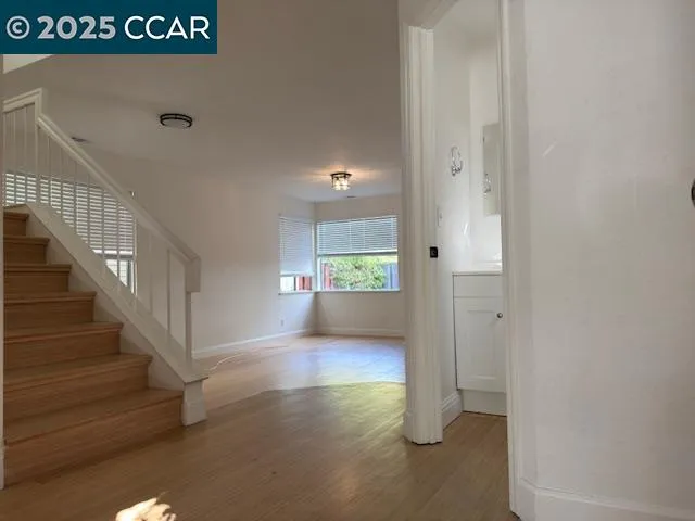 a kitchen with a stove and a refrigerator