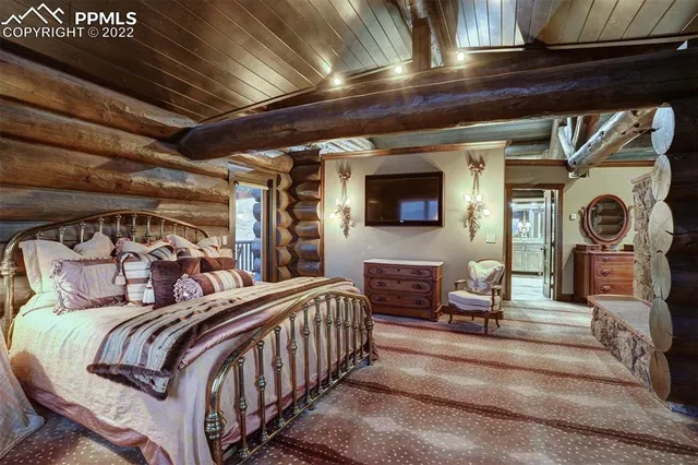 a bathroom with a granite countertop sink toilet a mirror and shower