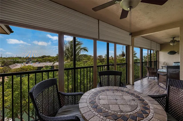 a view of a porch with furniture